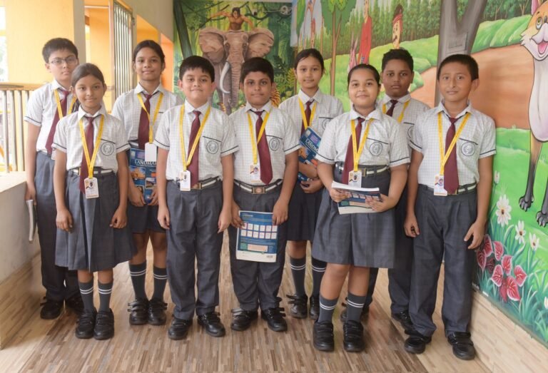 Group of pupils standing together in the school corridor