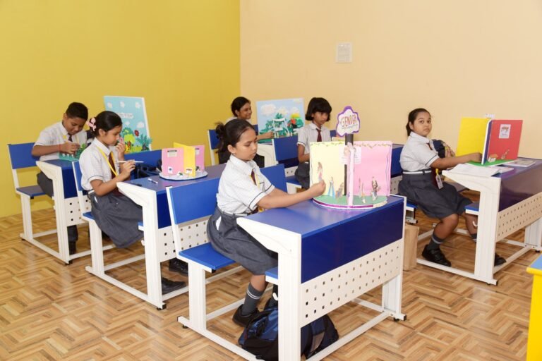 Class of pupils with their handmade project models